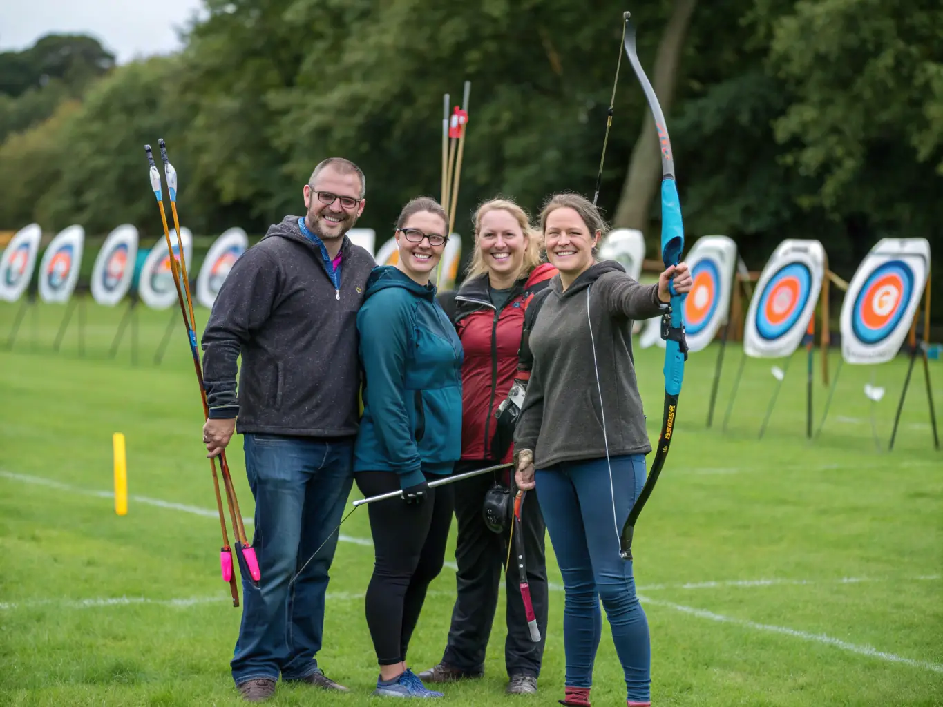 A photograph capturing the camaraderie and team spirit of archers participating in a community archery event, highlighting the social aspect and inclusive atmosphere of the club.